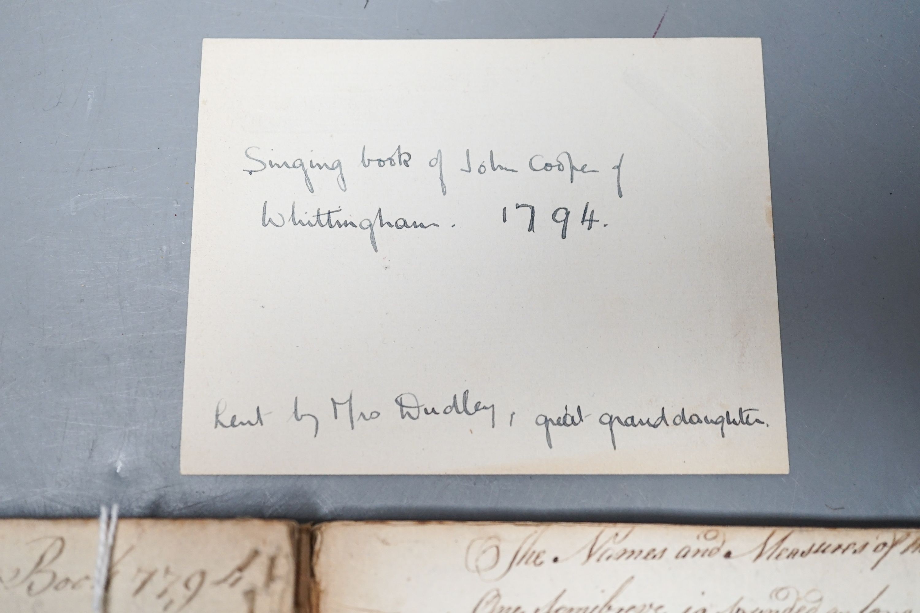 An 18th century book of hand-written psalm notations, inscribed ‘John Cooper his singing book 1794’